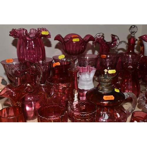 397 - A COLLECTION OF CRANBERRY GLASS to include six etched wine glasses, a quantity of Mary Gregory style... 