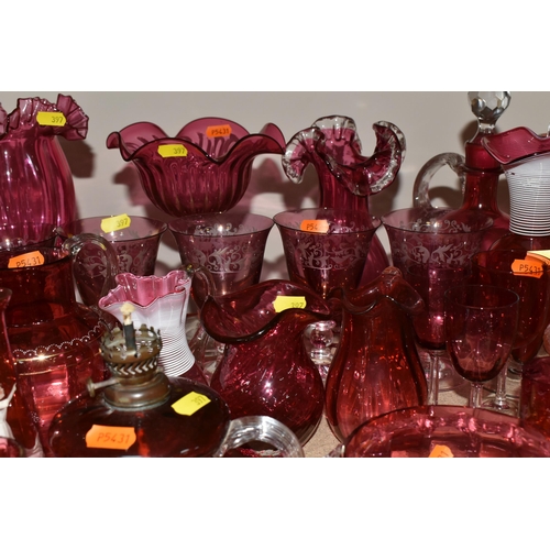 397 - A COLLECTION OF CRANBERRY GLASS to include six etched wine glasses, a quantity of Mary Gregory style... 