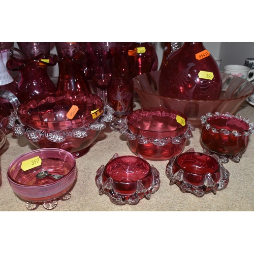 397 - A COLLECTION OF CRANBERRY GLASS to include six etched wine glasses, a quantity of Mary Gregory style... 