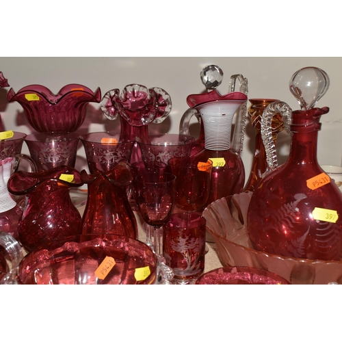 397 - A COLLECTION OF CRANBERRY GLASS to include six etched wine glasses, a quantity of Mary Gregory style... 