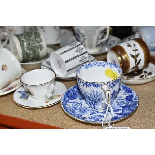 398 - A GROUP OF COFFEE CUPS AND SAUCERS FROM NAMED MANUFACTURERS comprising Wedgwood to include a Barlast... 