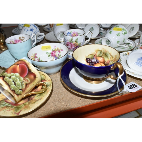 409 - A GROUP OF MOSTLY AYNSLEY COFFEE WARE to include various coffee cup and saucer sets to include Shang... 