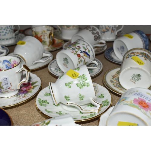 409 - A GROUP OF MOSTLY AYNSLEY COFFEE WARE to include various coffee cup and saucer sets to include Shang... 