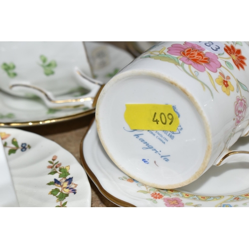 409 - A GROUP OF MOSTLY AYNSLEY COFFEE WARE to include various coffee cup and saucer sets to include Shang... 