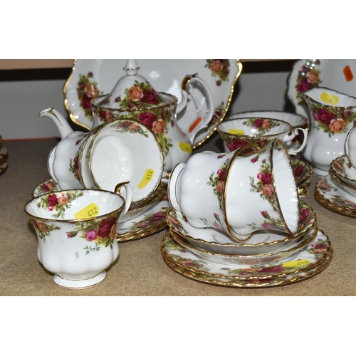 412 - A TWENTY-EIGHT PIECE ROYAL ALBERT OLD COUNTRY ROSES TEA SERVICE to include a teapot (chip to the lid... 