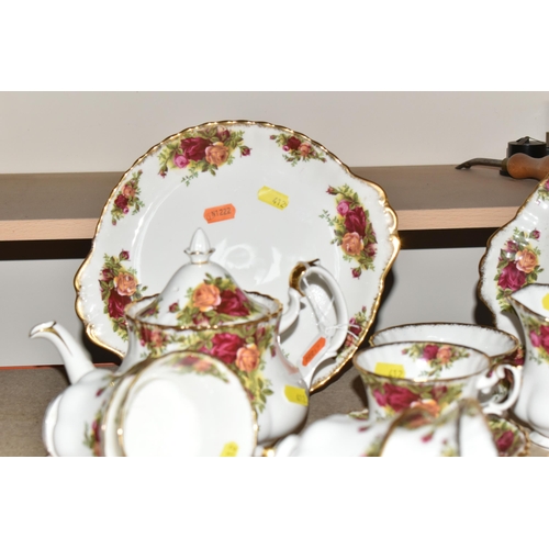 412 - A TWENTY-EIGHT PIECE ROYAL ALBERT OLD COUNTRY ROSES TEA SERVICE to include a teapot (chip to the lid... 