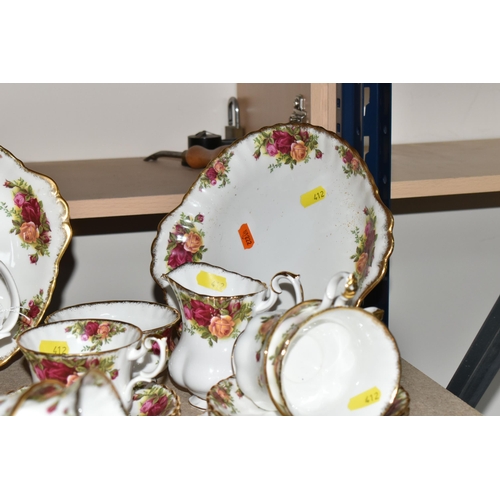 412 - A TWENTY-EIGHT PIECE ROYAL ALBERT OLD COUNTRY ROSES TEA SERVICE to include a teapot (chip to the lid... 