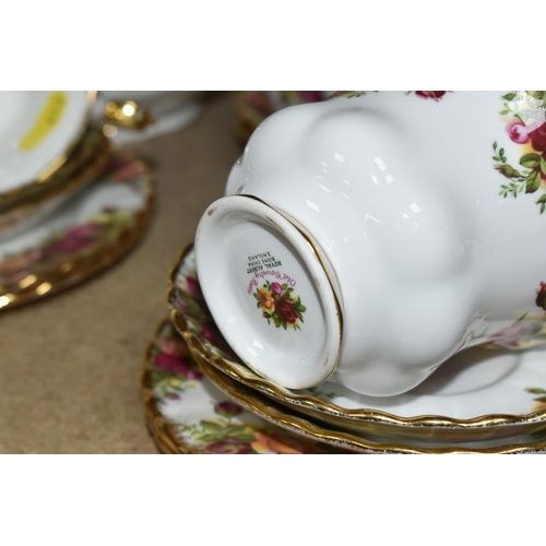 412 - A TWENTY-EIGHT PIECE ROYAL ALBERT OLD COUNTRY ROSES TEA SERVICE to include a teapot (chip to the lid... 