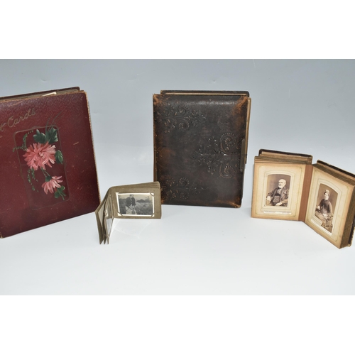 424 - Two Victorian/Edwardian Photograph Albums, both require restoration with a collection of portrait ph... 