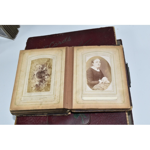 424 - Two Victorian/Edwardian Photograph Albums, both require restoration with a collection of portrait ph... 