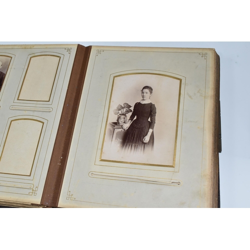 424 - Two Victorian/Edwardian Photograph Albums, both require restoration with a collection of portrait ph... 