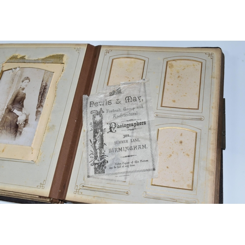 424 - Two Victorian/Edwardian Photograph Albums, both require restoration with a collection of portrait ph... 