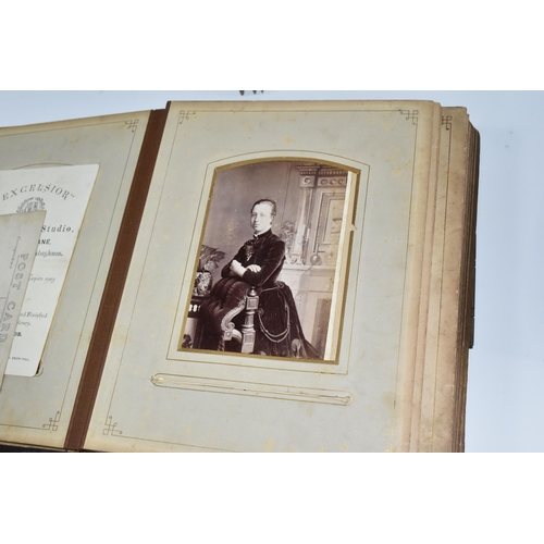 424 - Two Victorian/Edwardian Photograph Albums, both require restoration with a collection of portrait ph... 