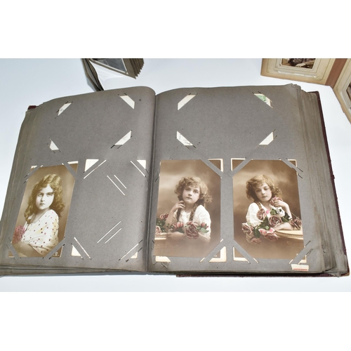 424 - Two Victorian/Edwardian Photograph Albums, both require restoration with a collection of portrait ph... 