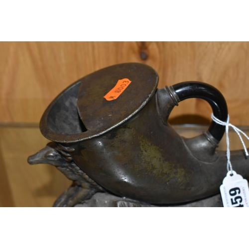 459 - A FIGURATIVE SPOON WARMER in the form of a horn with a stag rest on a landscaped base, length 27cm x... 