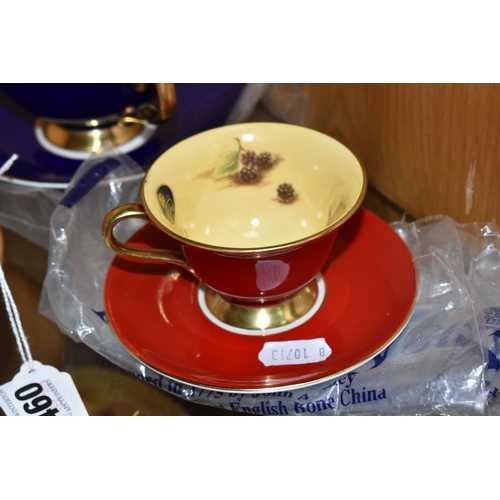 460 - THREE AYNSLEY CUPS WITH SAUCERS comprising one mottled mauve cup internal with an Orchard Gold patte... 