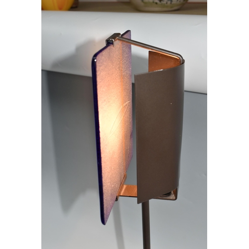 468 - A CLARISSE DUTRAIVE TABLE LAMP, with signed blue and red fused glass panel, on a metal stand, height... 