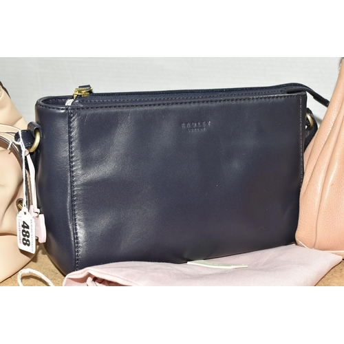 488 - TWO RADLEY AND ONE FIORELLI HANDBAGS, comprising an oyster coloured Fiorelli handbag with a removabl... 