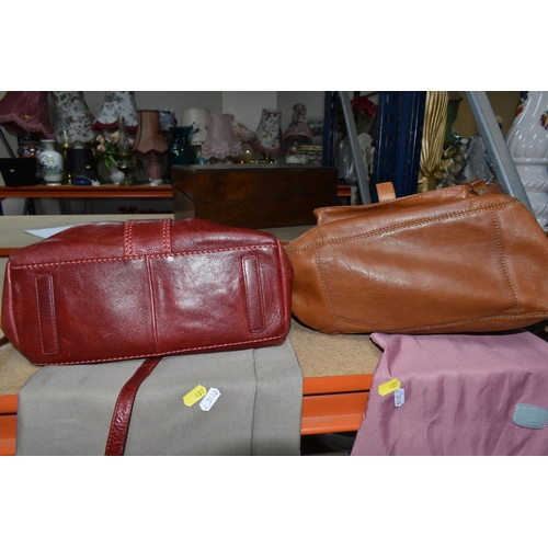 489 - TWO LEATHER RADLEY HANDBAGS, comprising a rust coloured shoulder bag with removable shoulder strap a... 