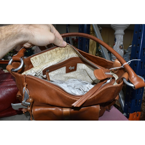 489 - TWO LEATHER RADLEY HANDBAGS, comprising a rust coloured shoulder bag with removable shoulder strap a... 