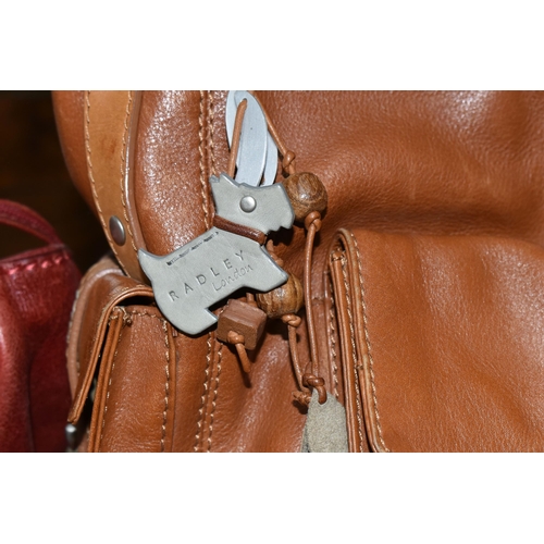 489 - TWO LEATHER RADLEY HANDBAGS, comprising a rust coloured shoulder bag with removable shoulder strap a... 