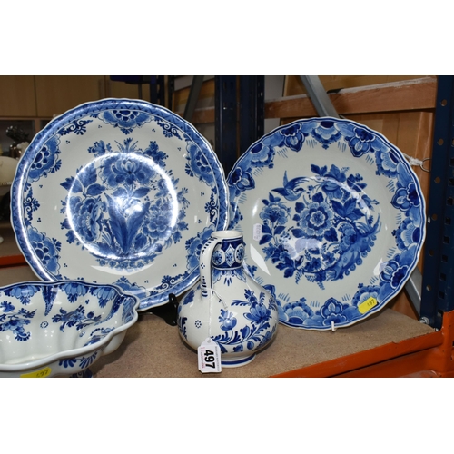 497 - A GROUP OF BLUE AND WHITE DELFT WARE CHARGERS AND VASE, comprising a floral design vase, height 26cm... 