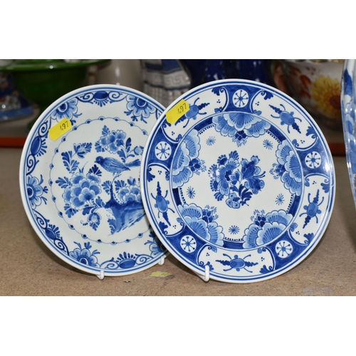 497 - A GROUP OF BLUE AND WHITE DELFT WARE CHARGERS AND VASE, comprising a floral design vase, height 26cm... 