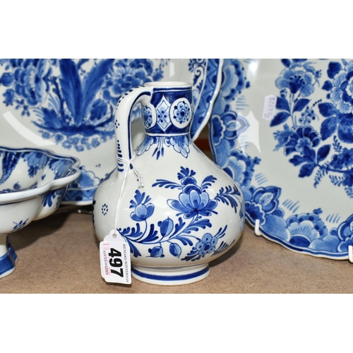 497 - A GROUP OF BLUE AND WHITE DELFT WARE CHARGERS AND VASE, comprising a floral design vase, height 26cm... 