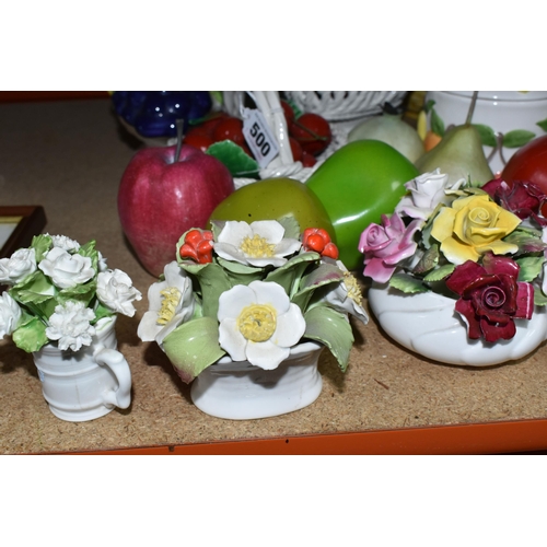 500 - A LARGE QUANTITY OF PORCELAIN FLOWERS AND FRUIT, together with three circular 'Barbola' mirrors, com... 