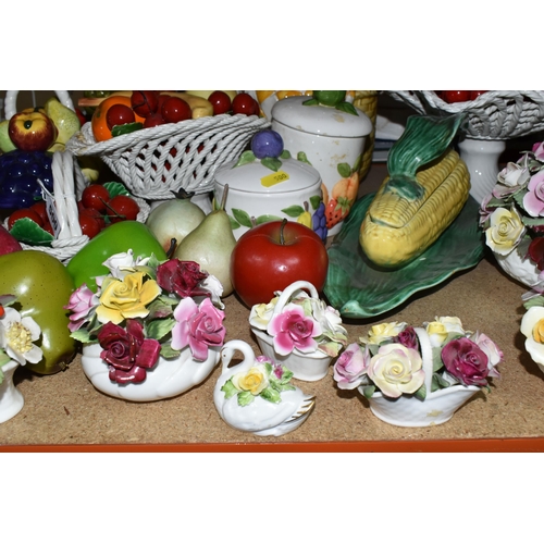 500 - A LARGE QUANTITY OF PORCELAIN FLOWERS AND FRUIT, together with three circular 'Barbola' mirrors, com... 