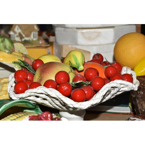 500 - A LARGE QUANTITY OF PORCELAIN FLOWERS AND FRUIT, together with three circular 'Barbola' mirrors, com... 