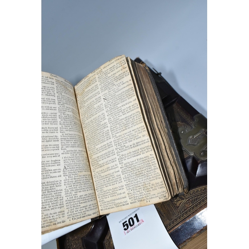 501 - TWO ANTIQUARIAN BIBLES comprising a large leather bound, brass clasped, gilt edged Holy Bible with C... 