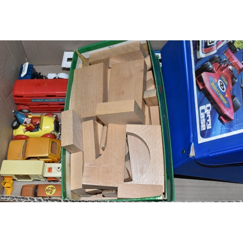 505 - TWO BOXES OF VINTAGE DIECAST TOY CARS AND BOARD GAMES, to include a Corgi Noddy's car, a red Corgi A... 