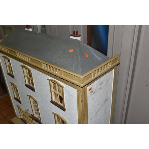 510 - A VINTAGE THREE-STOREY DOLLS HOUSE to include a nine room house with wooden dolls furniture, a magne... 