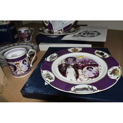 525 - A COLLECTION OF AYNSLEY ROYAL COMMEMORATIVE CERAMICS, to include bells, mugs, plates and a loving cu... 