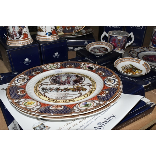 525 - A COLLECTION OF AYNSLEY ROYAL COMMEMORATIVE CERAMICS, to include bells, mugs, plates and a loving cu... 