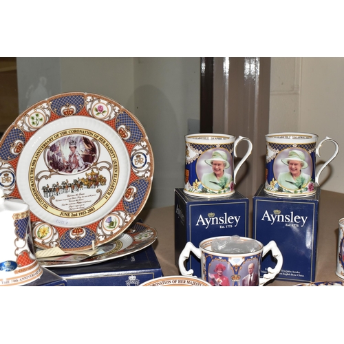 525 - A COLLECTION OF AYNSLEY ROYAL COMMEMORATIVE CERAMICS, to include bells, mugs, plates and a loving cu... 