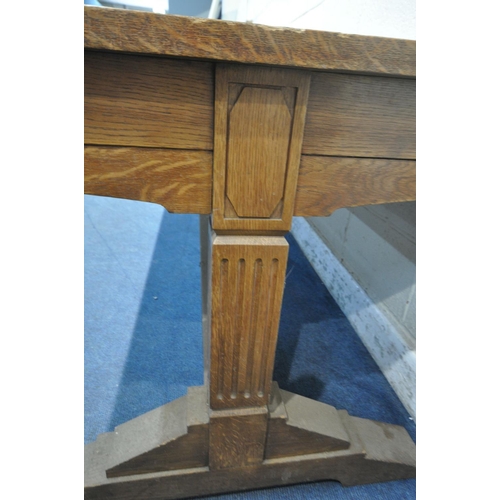 1197 - IN THE MANNER OF A.W.N PUGIN, A LARGE 20TH CENTURY OAK LIBRARY TABLE, with a tanned leather writing ... 