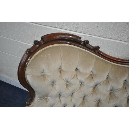 1200 - A VICTORIAN MAHOGANY FRAMED SOFA, the decorative frame with foliate scrolls, crest to top centre, bu... 