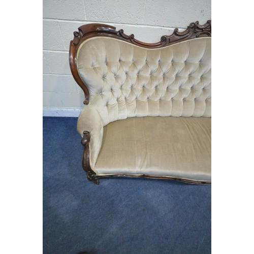 1200 - A VICTORIAN MAHOGANY FRAMED SOFA, the decorative frame with foliate scrolls, crest to top centre, bu... 