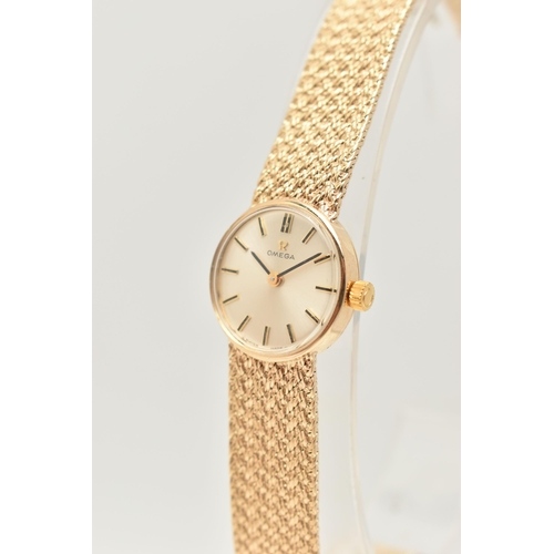 30 - A LADIES 9CT GOLD 'OMEGA' WRISTWATCH AND A ROLEX WATCH BOX, manual wind watch, round silvered dial s... 