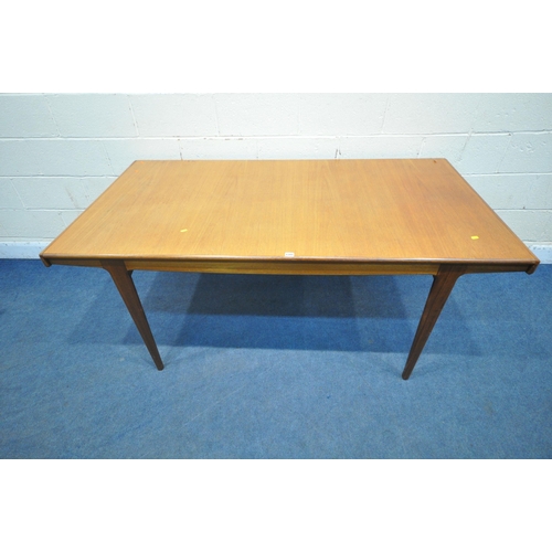 1201 - A MID CENTURY DANISH TEAK DINING TABLE, each end extending to reveal a leaf storage compartment, two... 