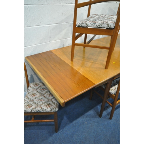 1201 - A MID CENTURY DANISH TEAK DINING TABLE, each end extending to reveal a leaf storage compartment, two... 