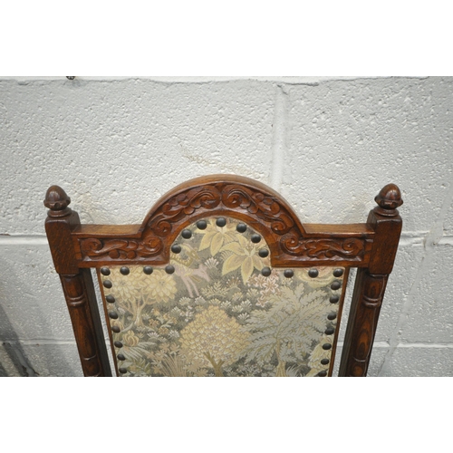 1206 - A SET OF SIX JAYCEE OAK CHAIRS, including two carvers, with an arched crest, twin finials, foliate u... 