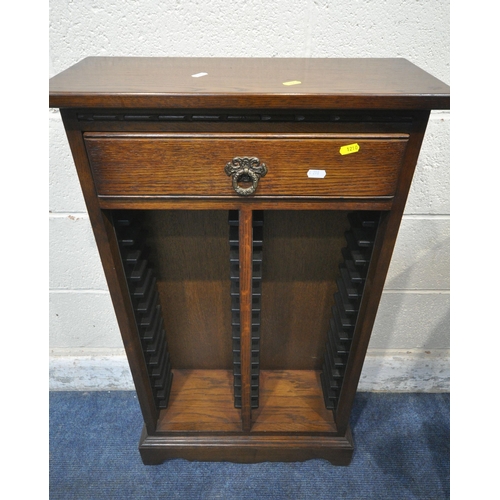 1210 - AN EDWARDIAN MAHOGANY BOW FRONT POT CUPBOARD, with a single door, raised on square tapered legs, 42c... 