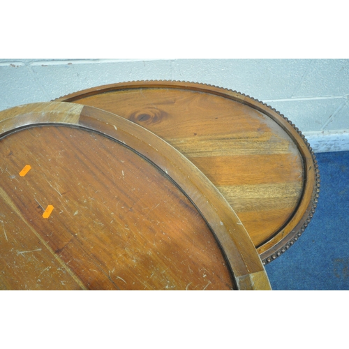 1232 - A REPRODUCTION HARDWOOD OVAL TRAY TOP COCKTAIL CABINET, with a single door, bevelled glass panes all... 