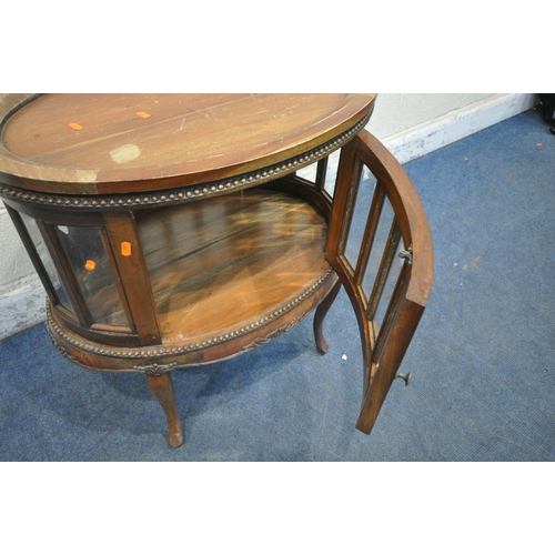 1232 - A REPRODUCTION HARDWOOD OVAL TRAY TOP COCKTAIL CABINET, with a single door, bevelled glass panes all... 