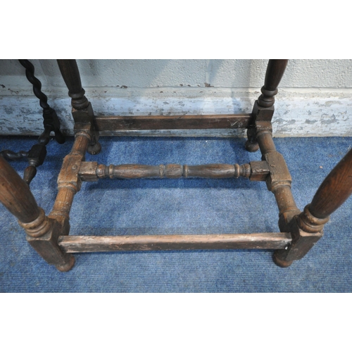 1244 - AN OAK LAMP TABLE, with a single frieze drawer, raised on turned legs, united by stretchers, width 6... 