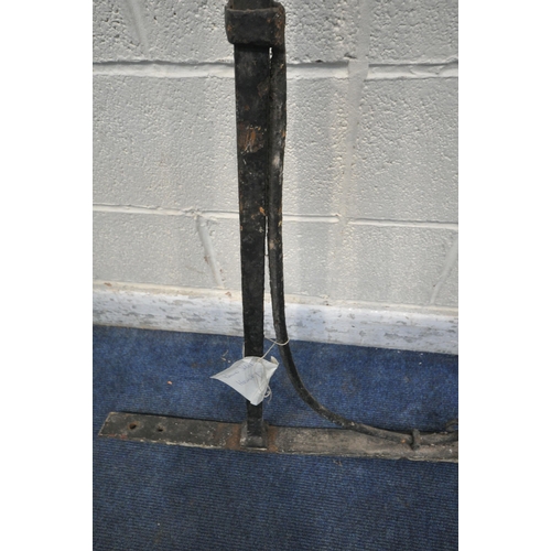 1253 - A 19TH CENTURY CAST IRON SHOP SIGN WALL BRACKET, length 138cm x height 81cm (condition report: histo... 