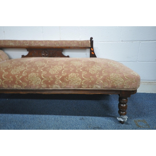 1260 - AN EDWARDIAN WALNUT PARLOUR SUITE, comprising a chaise lounge, length 175cm, an armchair, a large ch... 